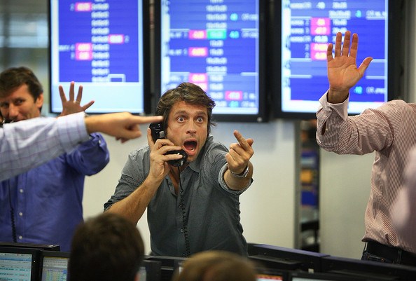 what is a day trader vs stock broker